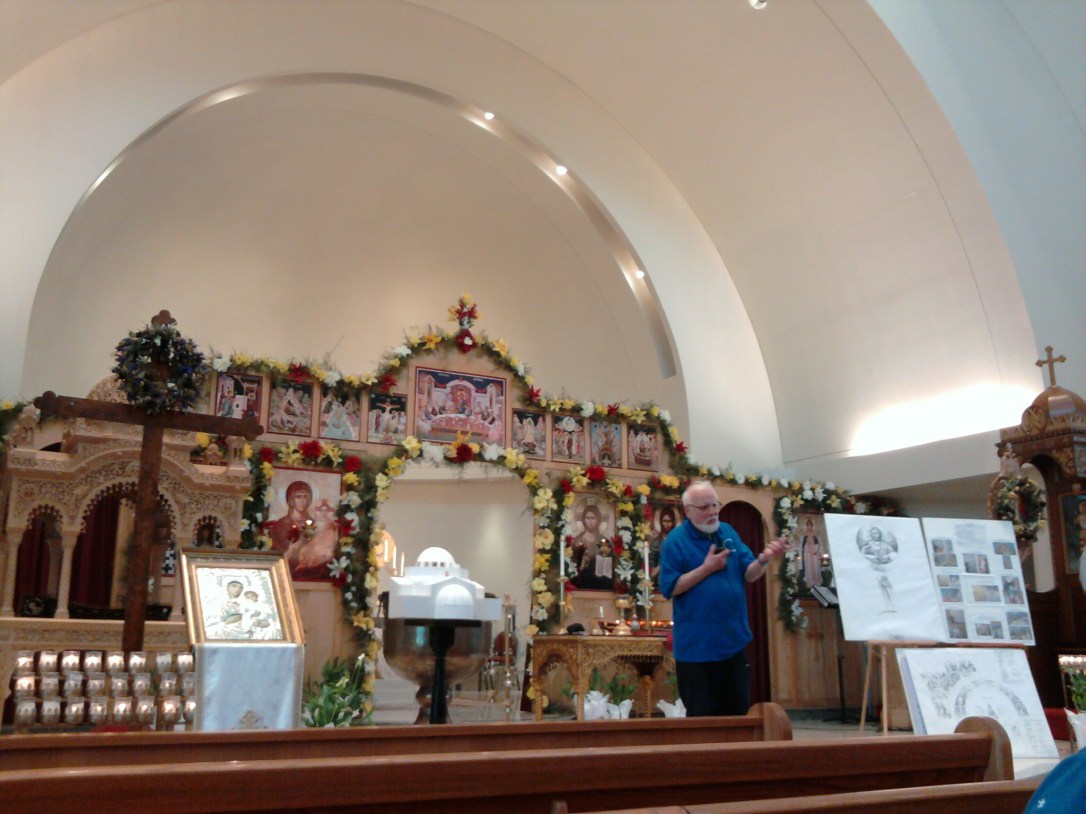 Our tour guide at Saint Nicholas. The Iconography behind him are "temporary" pieces.